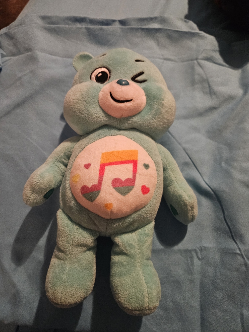Care Bears Mint Green Musical Bear Plush with Colorful Music Note Belly